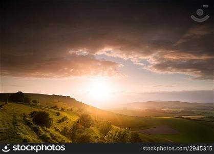 Stunning landscape at sunset over rolling English countryside