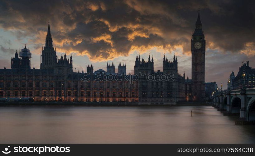 Stunning landscape image of Big Ben and Houses of Parliamnet in London during vibrant majestic sunset