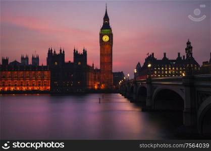 Stunning landscape image of Big Ben and Houses of Parliamnet in London during vibrant sunset