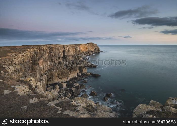 Stunning landscape image of cliffs around St Govan&rsquo;s Head on Pem. Beautiful landscape image of cliffs around St Govan&rsquo;s Head on Pembrokeshire Coast in Wales