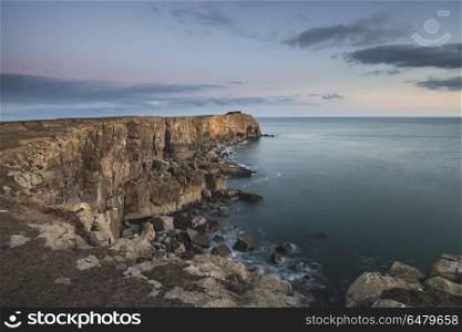 Stunning landscape image of cliffs around St Govan&rsquo;s Head on Pem. Beautiful landscape image of cliffs around St Govan&rsquo;s Head on Pembrokeshire Coast in Wales