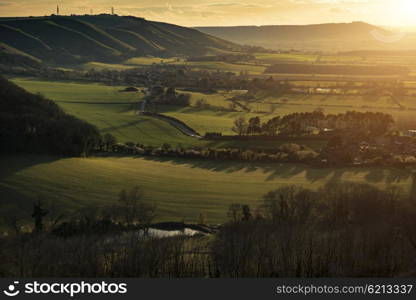 Stunning landscape image of sunset over countryside landscape in England