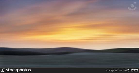 Stunning large panorama landscape of susnet over countryside with blur effect