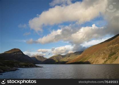 Stunning late Summer landscape image of Wasdale Valley in Lake District, looking towards Scafell Pike, Great Gable and Kirk Fell mountain range