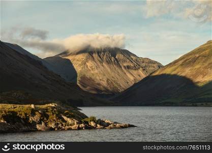 Stunning late Summer landscape image of Wasdale Valley in Lake District, looking towards Scafell Pike, Great Gable and Kirk Fell mountain range
