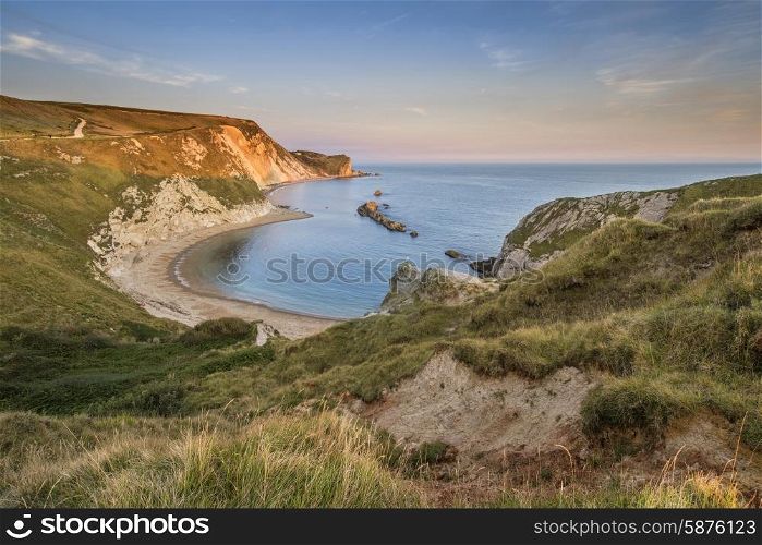 Stunning natural cove coastal landscape at sunset with beautiful sky