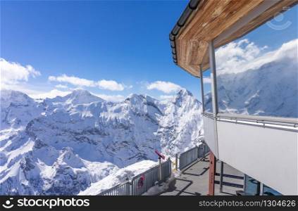 Stunning panoramic view of the Swiss Alps from the top of the Schilthorn mountain in the Jungfrau region of the country