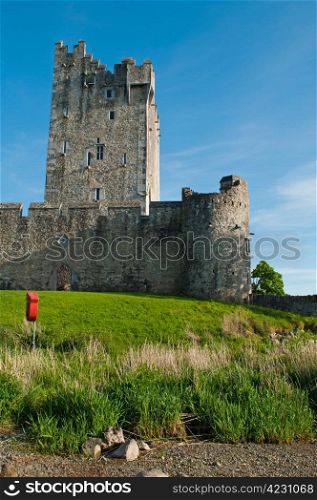 stunning Ross Castle in Killarney (County Kerry), Ireland (blue sky background)