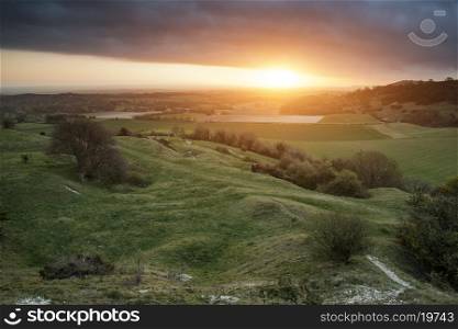 Stunning Spring sunrise over English countryside landscape escarpment