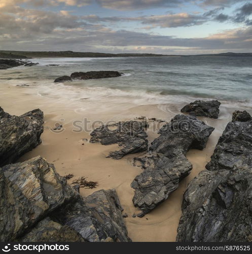 Stunning sunrise landscape of Godrevy on Cornwall coastline in England