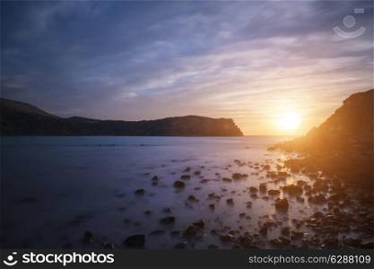 Stunning sunrise landscape over Lulworth Cove Jurassic Coast England