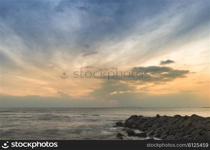 Stunning sunset landscape image of rocky coastline in Dorset England