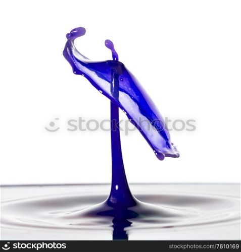 Stunning unique abstract water splash photography images with vibrant colorful water collisions captured using high speed flash technique