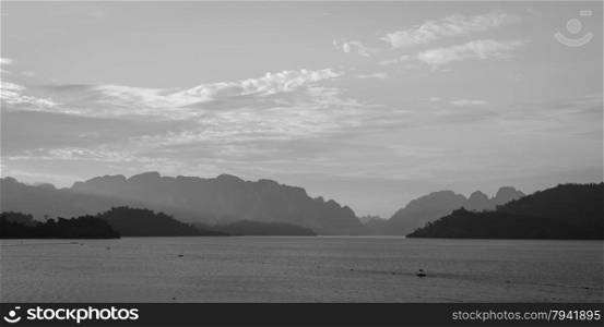 Stunning view of Limestone mountains and lake in Khao Sok National Park, Surat Thani Province, Thailand. Black and white color.
