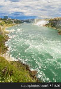 Stunning view of Niagara Falls with American Falls in autumn, view from Canadian side. Niagara falls in Ontario, Canada
