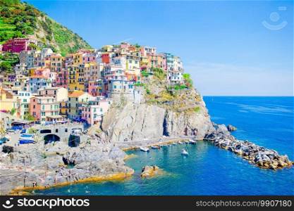 Stunning view of the beautiful and cozy village of Manarola in the Cinque Terre Reserve. Beautiful view of the amazing old village in the Cinque Terre reserve. Liguria region of Italy.