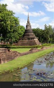 Stupa and moat in old Sukhotai, Thailand