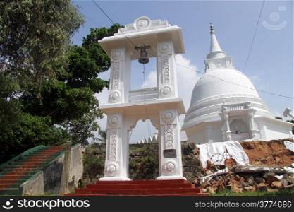 Stupa, bell tower and staircase in Sapugoda temple in Beruwala, Sri Lanka