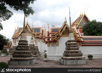 Stupas and temple in wat Pho, Bangkok, Thailand