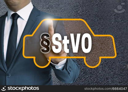 StVO auto touchscreen is operated by businessman concept.. StVO auto touchscreen is operated by businessman concept