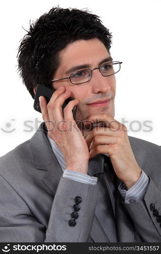 Stylish businessman talking on his mobile phone