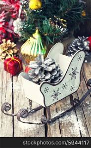 Stylish Christmas Santa&amp;#39;s sleigh with gifts and a bump.