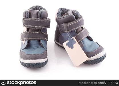 stylish, comfortable winter childrens shoes on a white background