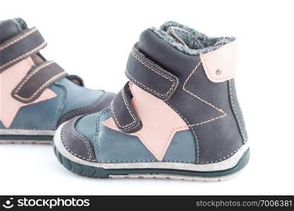 stylish, comfortable winter childrens shoes on a white background