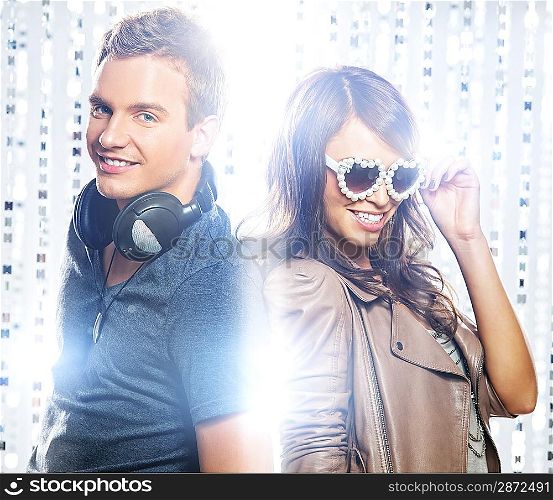 Stylish couple dancing in the nightclub
