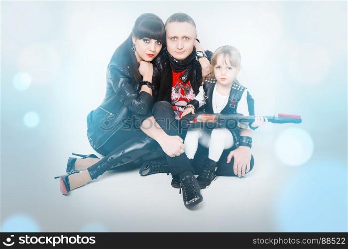 Stylish family in leather clothing