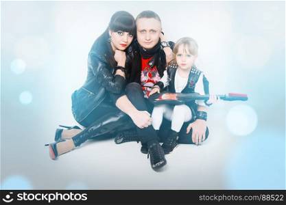 Stylish family in leather clothing
