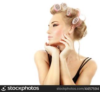 Stylish girl portrait with fashion makeup and hair curlers, isolated on white background, hair and beauty treatment concept