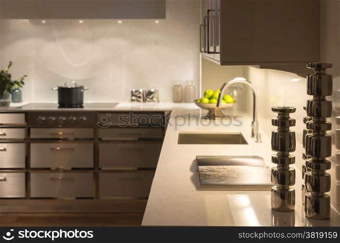 Stylish Modern Contemporary Kitchen with Underlighting and Silver Candle Sticks