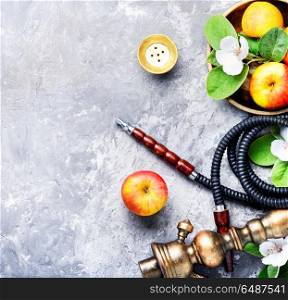 Stylish oriental shisha with apple. East hookah with the aroma apple for relax.Apple shisha.Shisha hookah