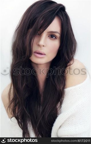 Stylish portrait of a young woman with natural make-up. Natural light.
