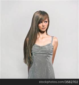 Stylish shot of nice young long hair woman in dress