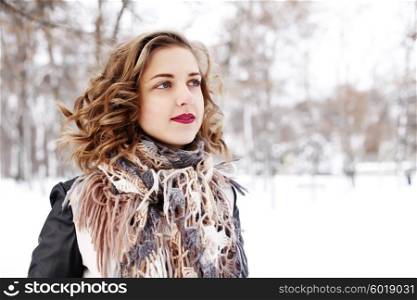 stylish street fashion concept - young slim blond woman with purple lips and curly hair having fun. hair care, fashion bob hairstyle. fashion blogger girl outdoors