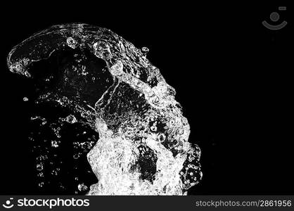 Stylish water splash. Isolated on black background