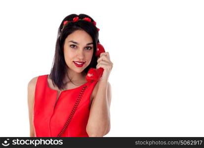 Stylish woman in red calling isolated on a white background