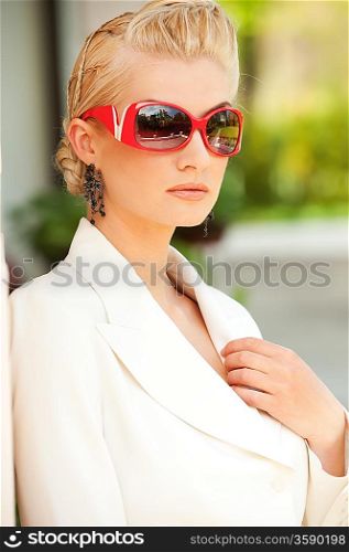 Stylish woman in sunglasses portrait
