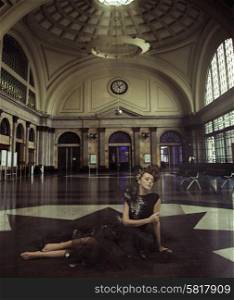 Stylish woman in the railway station