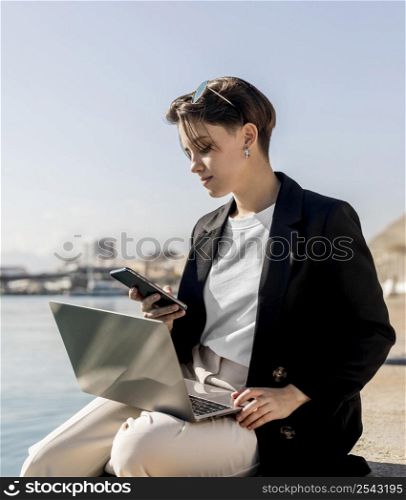 stylish woman working outside sunny day 2