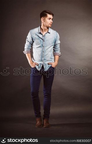 stylish young brunet in jeans shirt