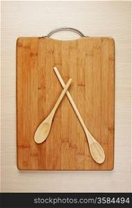 stylized clock - cutting board and wooden spoons