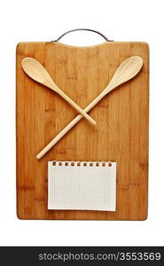 stylized clock - cutting board and wooden spoons isolated on a white background