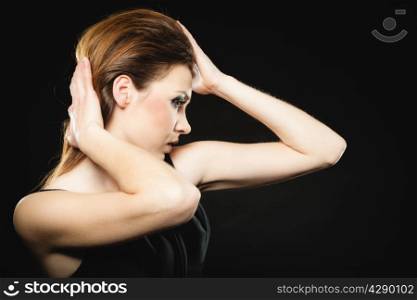 Subculture, beauty punk or rocker style girl portrait on black background