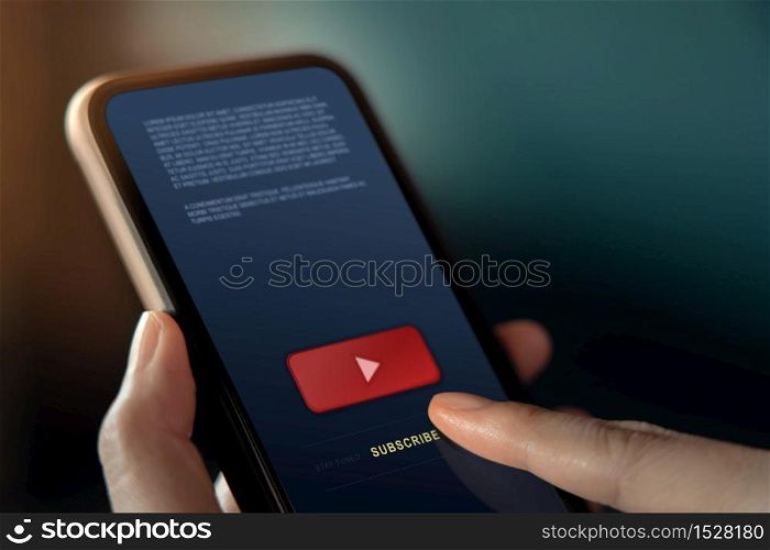 Subscribing and Digital Marketing Concept. Closeup of Woman using Smartphone to making Subscribe on a Favorite Channel. Media Content Strategy