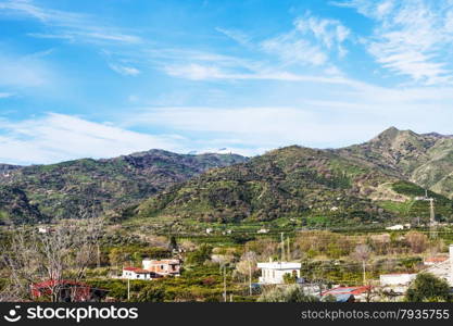 suburb of town Gaggi in green hills, Sicily, Italy in spring