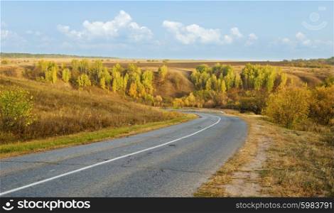 Suburban highway in the countryside in autumn