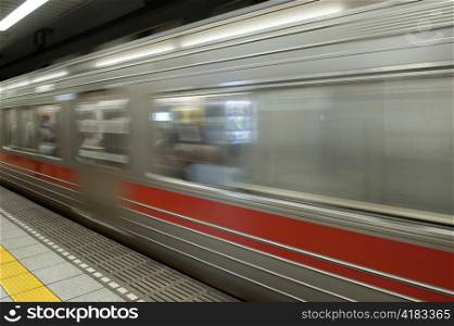 Subway train in motion, Tokyo, Japan